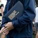 Michigan Marching Band Director Scott Boerma holds a binder full of sheet music at the end of practice on Thursday. Daniel Brenner I AnnArbor.com